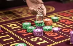 PURE Casino casino presented on mobile device in Pakistan with slots and live games
